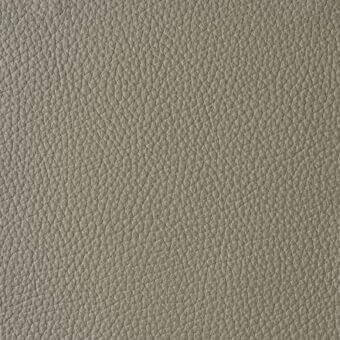 Gray leather texture sample, pebble-grain pattern, matte finish, natural variation in shading, durable material for upholstery applications.