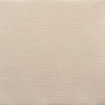 Acrylic fabric swatch in ecru tone, displaying a tight weave and matte texture, suitable for upholstery applications with visible label details.