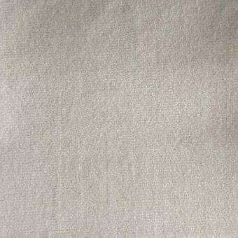 Low-pile Rugiano rug, neutral gray, consistent weave texture, clean edges, indoor fabric 011 7077n, studio product shot, diffused lighting.