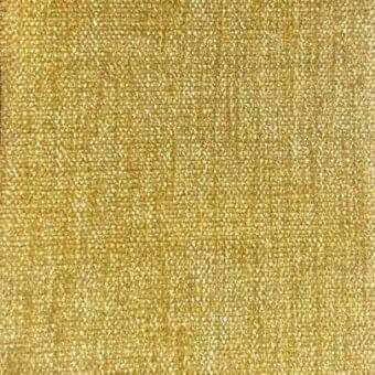 Gold textured rug with dense woven appearance, exhibiting a warm granular pattern and subtle light-to-dark gradient across the surface.
