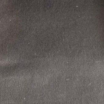 Rugiano 7022n indoor rug, dark gray woven fabric, dense matte texture with subtle tonal variations, studio shot.