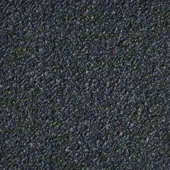 Dark gray rug with dense, granular texture and mottled tone, displaying a uniform fabric surface and subtle color variations throughout.