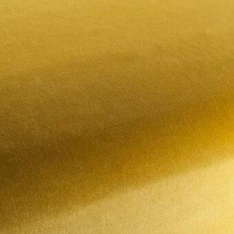 Rugiano rug, gold-toned indoor fabric, gradient texture with matte finish and looped construction, soft diffused lighting.