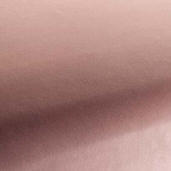 Rugiano fabric sample, dusty rose color, matte texture with tonal gradient and woven looped construction, soft diffused lighting.