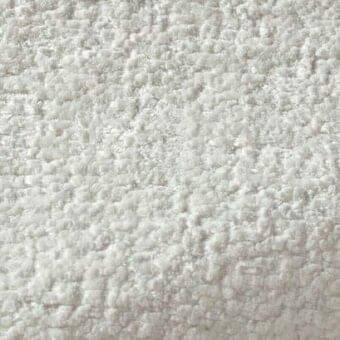 Rug, off-white nubby loop pile, densely textured surface; Rugiano “16622001 – Perla” with randomized loops and soft fabric-like quality.