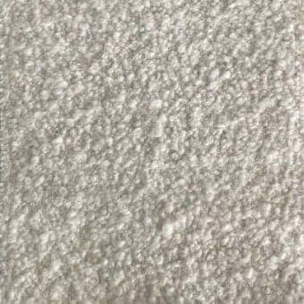 Light gray textured rug with dense nubby pile and heathered appearance, featuring an irregular looped surface and plush granular pattern.