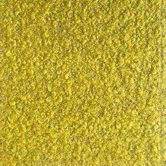 Rugiano rug, golden-yellow texture, dense undulating surface with irregular bumps and ridges, olive-green undertones, neutral background.