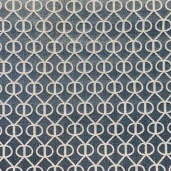 Geometric rug with interlocking circles and vertical lines in muted blue-gray, beige outlines, woven texture, indoor fabric RR519.