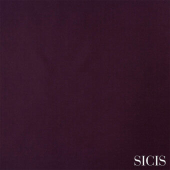 SICIS fabric sample in grape color, matte texture, fine granular pattern, studio shot displaying material appearance and collection details.