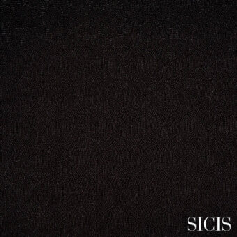 Black woven fabric texture sample displaying a granular pattern, with “SICIS” logo; studio shot emphasizing material depth.
