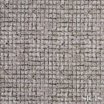 Sicis Eliodoro fabric sample in grey features a raised, geometric pattern resembling cracked earth with a matte finish and subtle brand imprint.