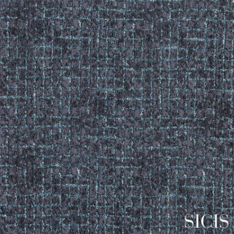 Sicis Eliodoro fabric swatch in navy blue displays a dense, woven tweed texture with heathered tones and subtle shimmering light blue threads.