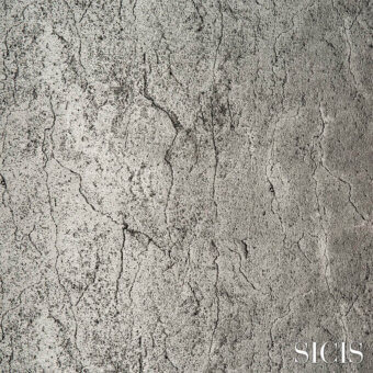 Marmor platinum fabric texture displaying a muted gray, granular surface with irregular dark gray cracks and a mottled, aged stone appearance.