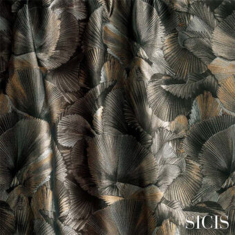 Palm leaf fabric with gray, bronze, and beige tones displays a repeating, etched pattern and subtle sheen, identified as “palmeres natural”.