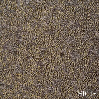 Sicis Zaira fabric texture, silver-grey with golden accents, features swirling, wave-like patterns and a raised, three-dimensional surface.