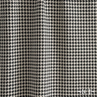 Houndstooth fabric swatch in black and off-white with a woven texture, displaying the “SICIS andrew” textile collection name.