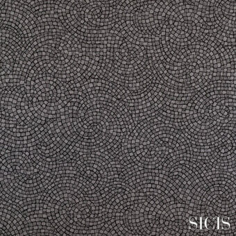 Gray mosaic textile pattern, “Astrea Iron” by Sicis, features interlocking square tesserae in swirling wave motif with a stone-like texture.