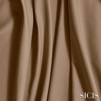 Leather sample, coral colored, vertically draped; matte finish with sheen, showcasing texture and fluidity; SICIS brand detail visible.