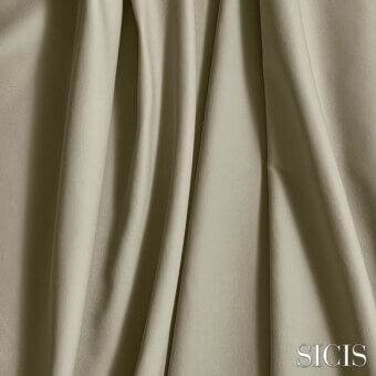Sicis leather sample, balmoral limestone, warm gray-beige, textured, vertical pleats, matte finish, neutral gray background.