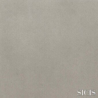 Gray-beige textured material sample with granular surface, matte finish, and white “SICIS” lettering; uniform composition.