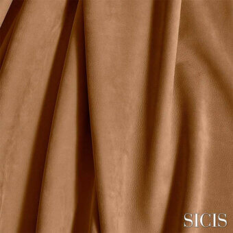 Vermont Brandy leather close-up displays a rich brown, textured surface with natural grain and soft draping, featuring SICIS branding.