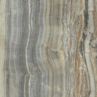 Grey onyx texture sample displaying layered bands of muted grey, beige, tan, and brown with a smooth, polished, translucent stone composition.