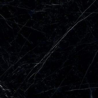 Dark gray marble surface with dense white veining, displaying irregular lines and diagonal streaks, polished reflective finish.