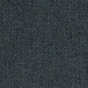 Step fabric, dark teal melange, granular texture from Sovet Italia’s collection; tightly packed particles create a slightly rough surface.