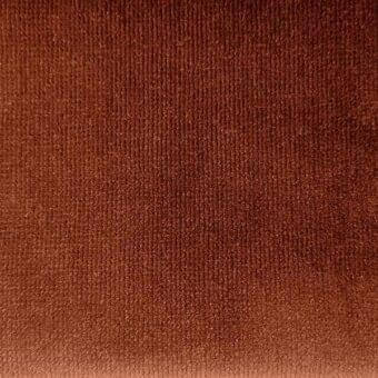 Brown velvet fabric texture displaying a vertical rib weave and soft diffused light, showcasing a dense, plush pile and tonal variations.