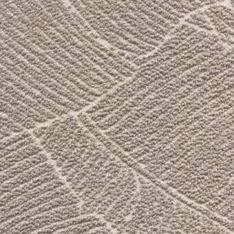 Looped pile fabric texture in gray-beige with radiating line pattern, exhibiting a nubby surface and diffused light reflection.