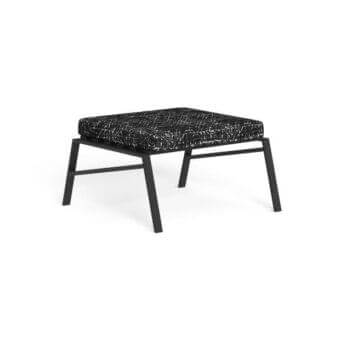 Square ottoman, black and white patterned fabric, black metal legs, minimalist design, studio product shot, contemporary furniture.