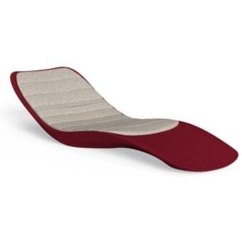 Talenti lounger, red molded shell, asymmetrical form, beige quilted interior, wide flat base, modern minimalist design, studio shot.