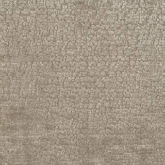 Beige woven fabric texture with dense, nubby loops and a subtle grid pattern, displaying a matte finish and tonal variations.