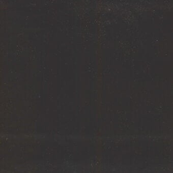 Dark gray mottled texture with light specks, featuring a central vertical band and granular finish, identified as “turri fabric cat. b 701 e.”