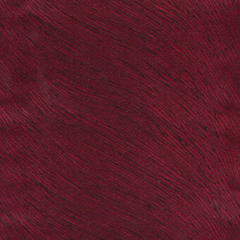 Burgundy fabric sample with diagonal ribbing, dense weave texture, 725 g weight, consistent color, and directional thread pattern displayed.