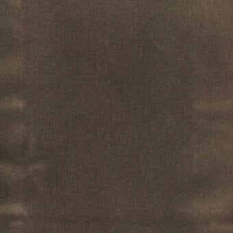 Brown velvet fabric texture with a dense pile, displaying a mottled effect and a “turri > fabric cat. b > 726 b” label.
