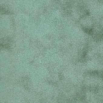 Textured fabric sample in dusty teal with a granular, matte finish and short dense pile; labeled “turri > fabric cat. b > 744 g”.