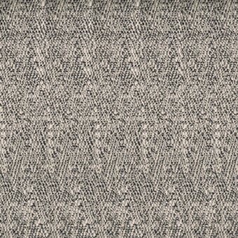Beige and brown woven fabric sample with a speckled texture, tight weave, and irregular surface; label reads "turri > fabric cat. b > 758 a."