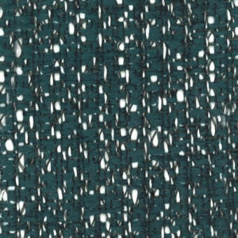 Teal woven fabric sample with white threads, exhibiting a nubby boucle texture and tight weave; label reads "turri > fabric cat. b > 775 d."