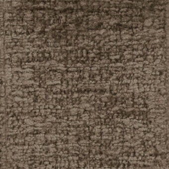 Brown looped pile fabric texture with nubby surface, displaying “turri > fabric cat. b > 778 b” label, warm neutral tones.