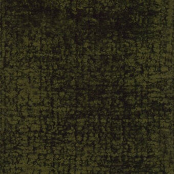 Dark olive green fabric sample with mottled, irregular texture; woven or distressed appearance, matte finish, against a dark gray background.