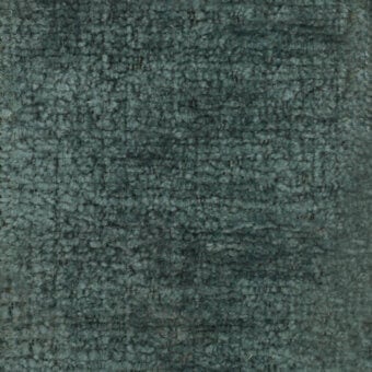 Teal-gray looped pile fabric texture with nubby surface, uniform weave, and printed text “turri > fabric cat. b > 778 e” along the bottom edge.