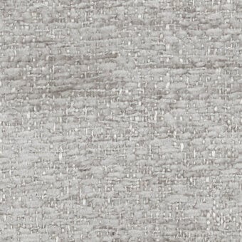 Light gray herringbone fabric texture with silver flecks, dense nubby weave, and “turri > fabric cat. b > 781 g” label visible.