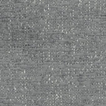 Gray textured fabric sample with dense nub formations, displaying “turri fabric cat. b > 781 i” tag, heathered weave.