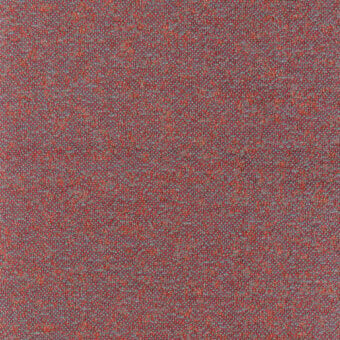 Reddish-brown woven fabric sample with gray and orange flecks, displaying a dense, granular texture and matte finish; label reads “turri > fabric cat. f > 768 m.”