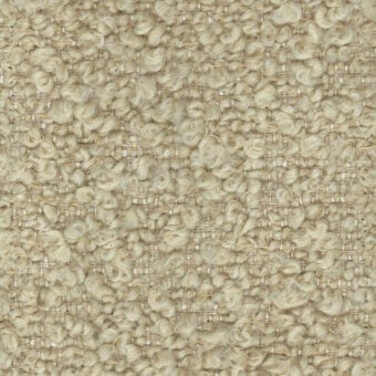 Cream boucle fabric sample with heathered off-white and beige linear threads, displaying a dense, nubby woven texture and “turri” label.