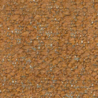 Golden-brown looped pile fabric with a grid pattern of beige threads, dense woven texture, and a nubby surface; label reads "turri > fabric cat. t > 765 l."