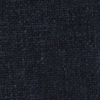 Navy blue Turri fabric texture with a dense, irregular weave and 770 g weight, displaying a nubby surface and directional fiber pattern.