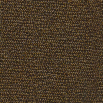 Woven fabric sample, charcoal brown and mustard yellow, irregular speckled texture with visible knots and matte finish, label reads “turri”.