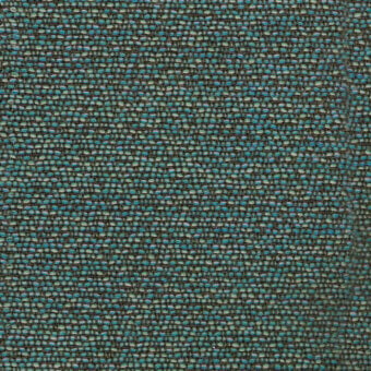 Teal woven fabric sample with gray and mint threads, dense irregular weave, nubby texture, label reads “turri > fabric cat. t > 779 i.”
